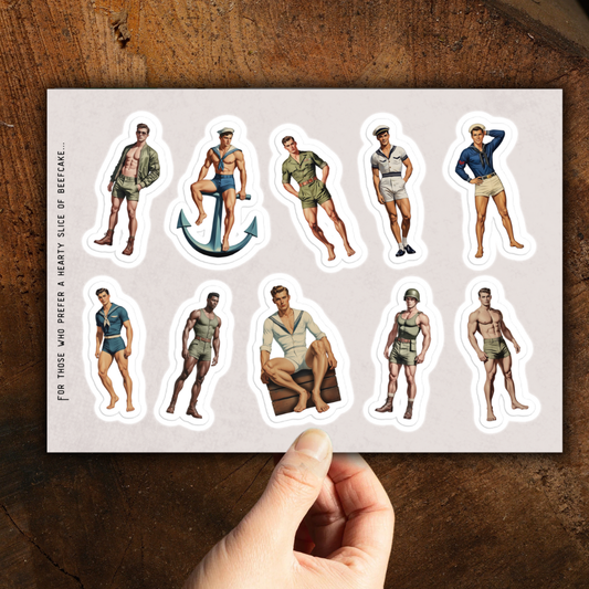 Sheet of vintage-style male figure stickers on a wooden surface