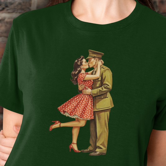 Green t-shirt with a vintage-style graphic of a soldier and a woman in a red dress, worn by a person.