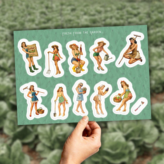 Sheet of garden-themed stickers held by a hand with a green plant background