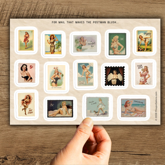 Collection of vintage-style postage stamps featuring pin-up girls on a wooden surface.