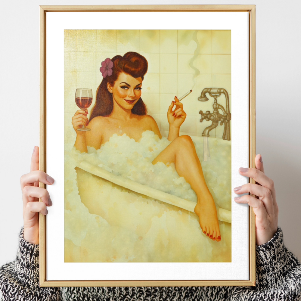 Framed artwork of a woman in a bathtub with a glass of wine and a cigarette.