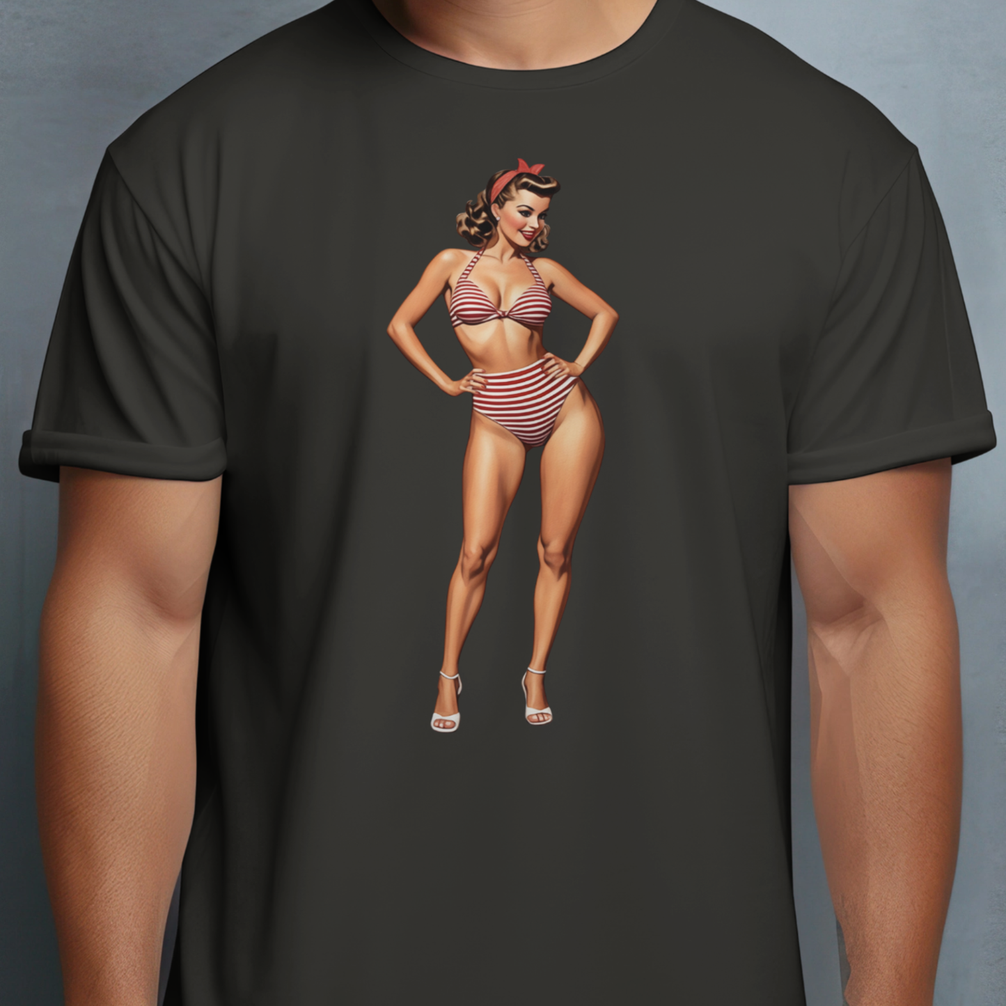 Black t-shirt with a graphic of a woman in a bikini on a gray background