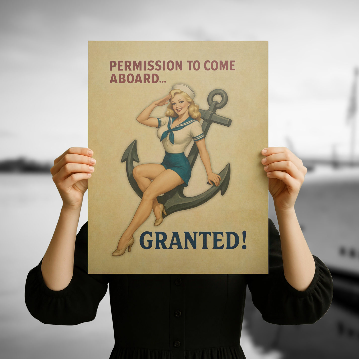 Person holding a poster with a vintage-style illustration of a woman and anchor, with text 'Permission to come aboard.