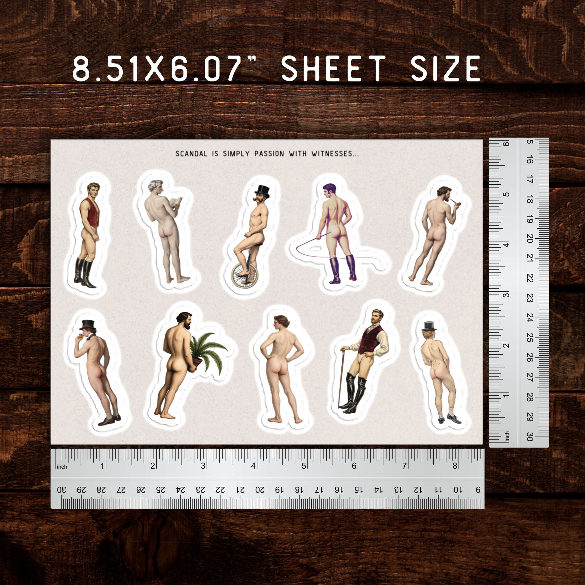 Sheet of stickers with various poses on a wooden surface with rulers for scale.